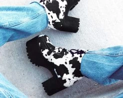 Black & White Cow Print Nosebleed Boot -Urban Sole Shop A9935L product photo 6fbd8cb7 dc75 416f 85cc e5dd8b92f431